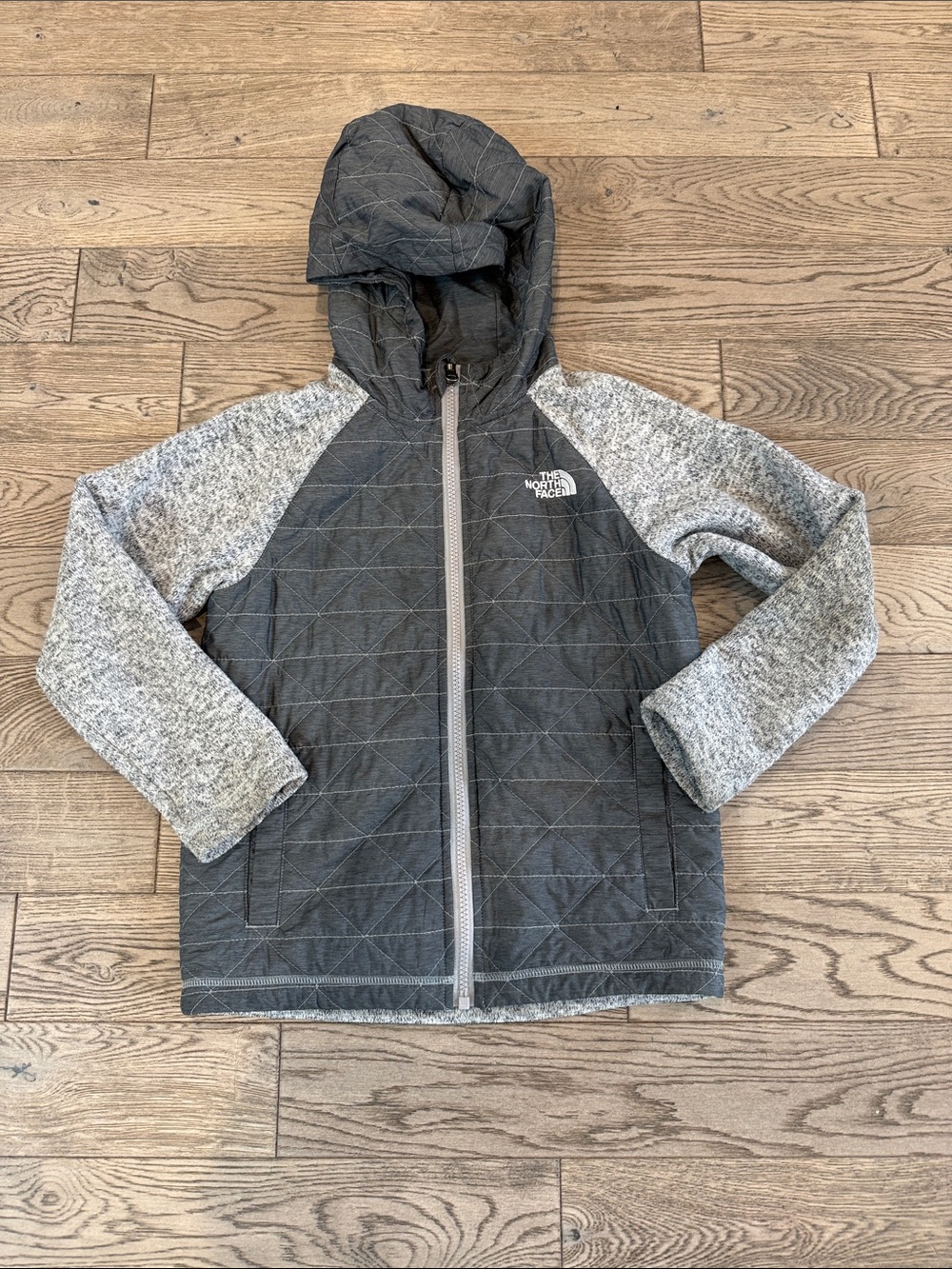 The North Face Kids' Dark Gray Quilted Hooded Jacket with Heather Gray Sleeves